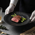 Nordic minimalist black and white ceramic steak plate - western dinner plate for restaurant, home, and hotel use - flat plate with unique creative presentation