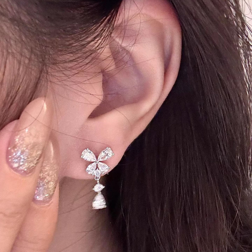 Exquisite bowknot teardrop zircon stud earrings: minimalist, unique, and chic. a touch of luxury for the modern woman