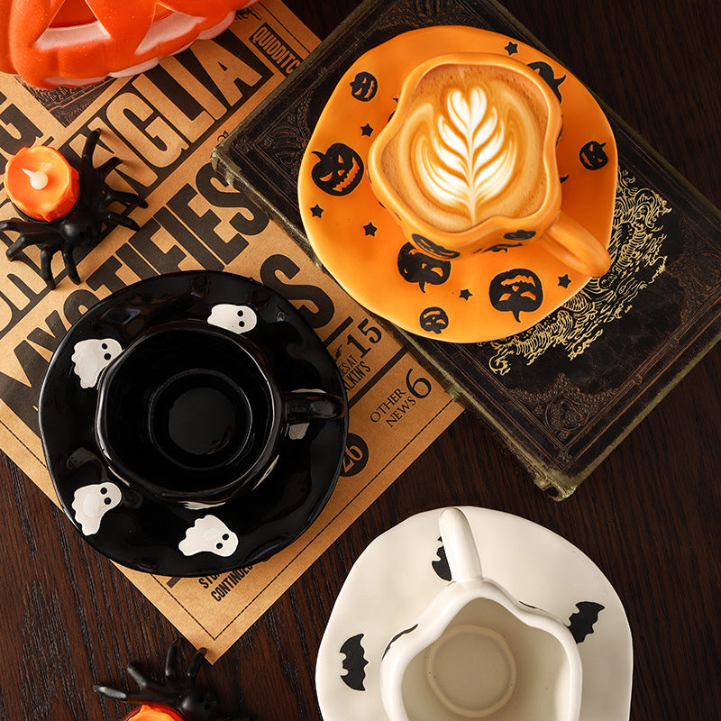 Creative halloween-themed ceramic cup and saucer set, featuring an irregular design with pumpkin and bat motifs. perfect for coffee or tea