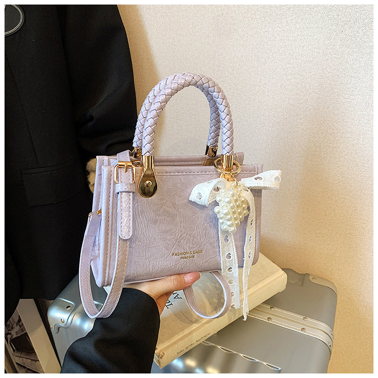 Cross-border super fire small bag women's summer versatile 2025 new fashion simple messenger bag popular portable small square bag