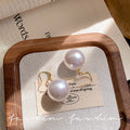 French style large pearl earrings - niche, vintage-inspired, light luxury design. high-end ear hooks, minimalist, elegant, and versatile fashion earrings