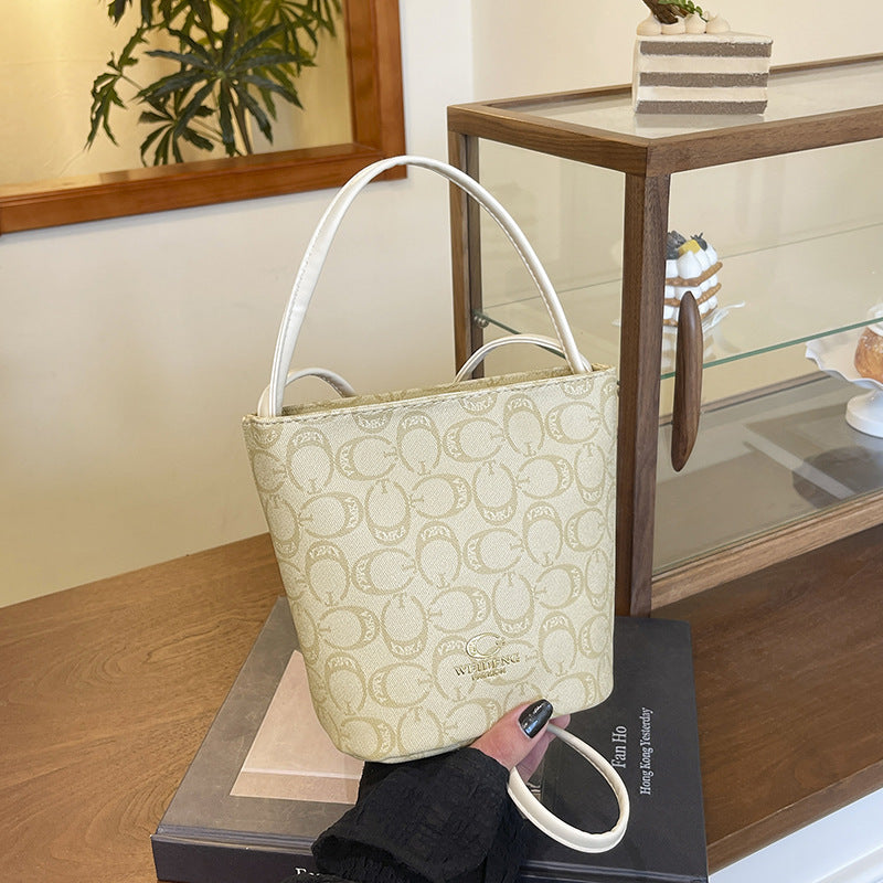 Guteco's new textured bucket bag fashion handbag women's 2025 new large-capacity messenger bag mobile phone bag