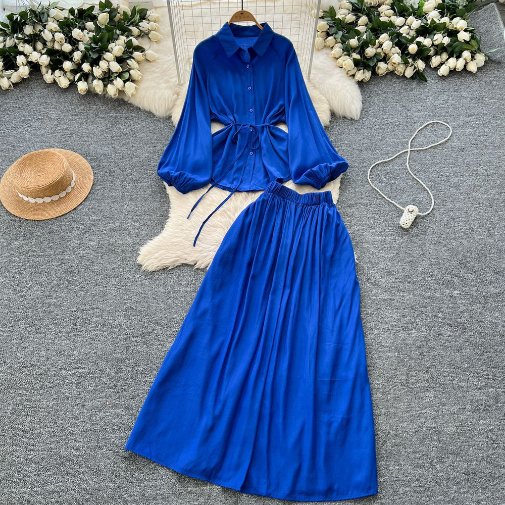 Minimalist solid color elegant women's spring outfit: bubble sleeve tie-up blouse + elastic waist slimming midi skirt