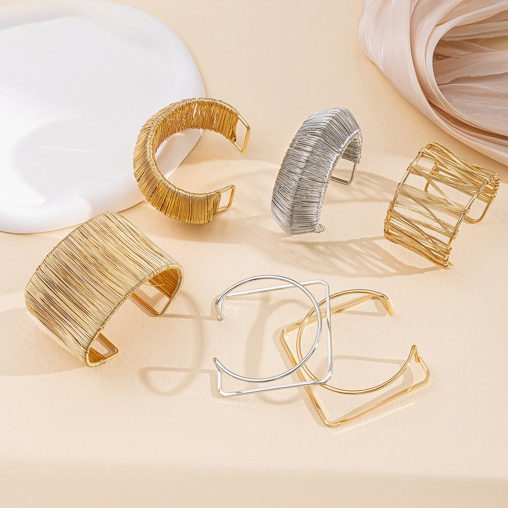 Wholesale alloy bracelets: european & american cross-border fashion jewelry - minimalist bangles with unique, bold geometric designs for women
