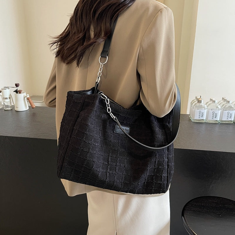 Canvas tote bag women's large capacity 2025 new casual shoulder bag summer versatile senior sense class commuter bag