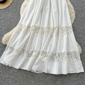 French riviera style white lace trim halter dress - high waist a-line maxi dress for a chic and alluring look