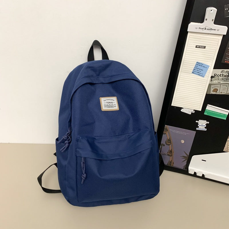 New fashion simple trend backpack large capacity lightweight travel backpack Korean version of junior high school student schoolbag