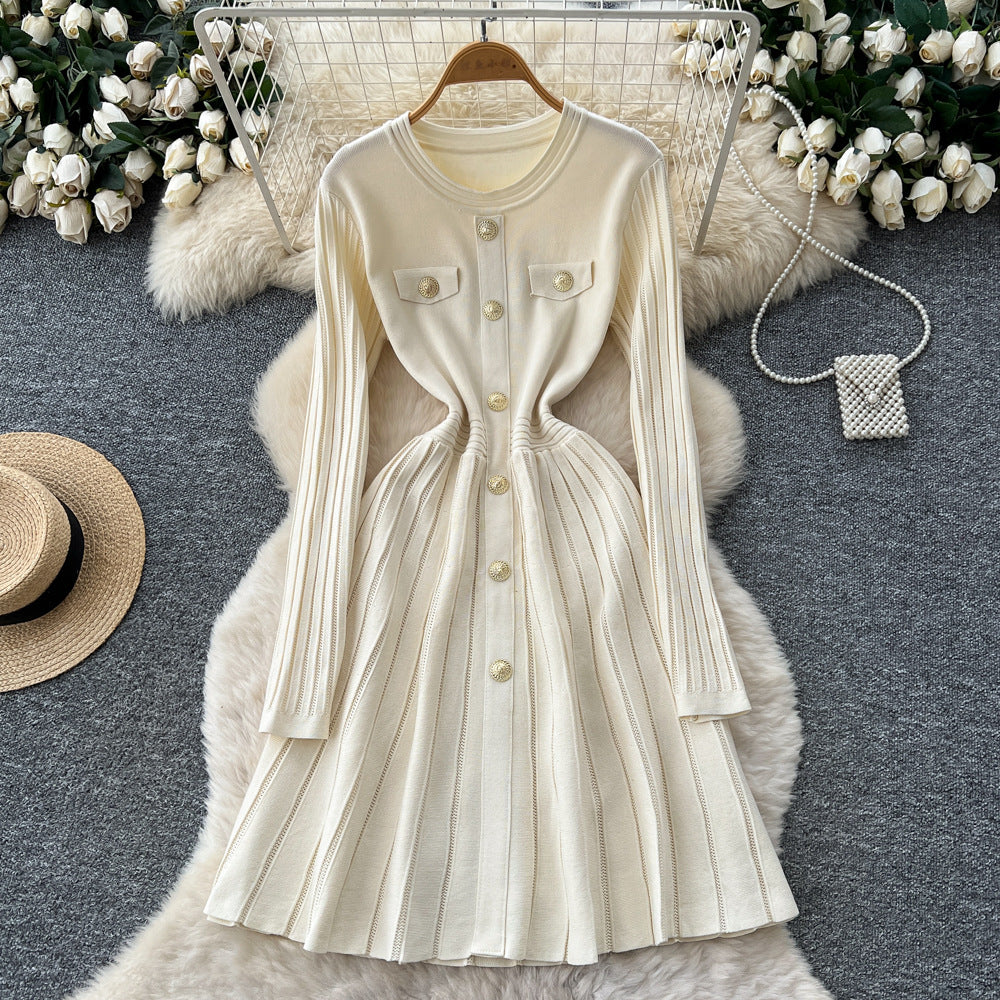 French chic, high-end, luxurious knitted dress with heavily embellished metal buckle – perfect for autumn/winter, featuring a cinched waist and ideal as a layering piece