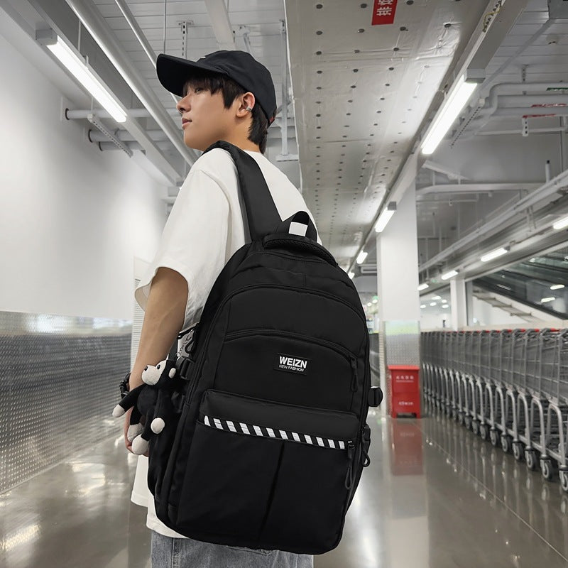 School bag male large capacity junior high school student middle school student fashion trend simple backpack female business travel bag