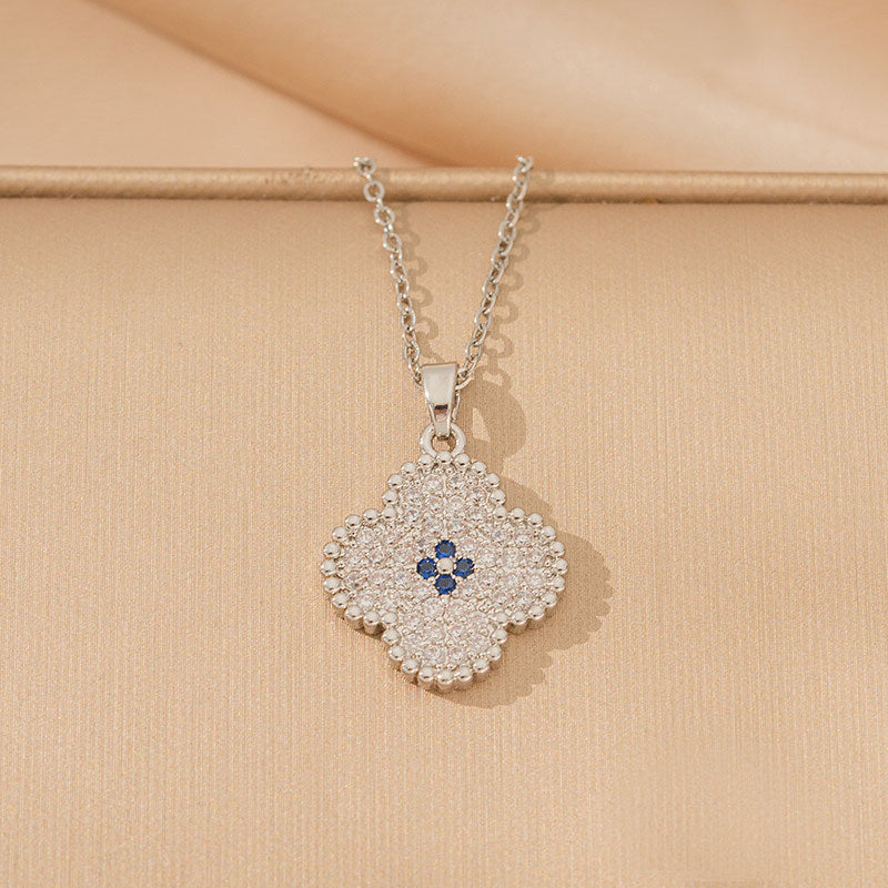 popular zircon-inlaid four-leaf clover necklace, accessible luxury, niche women's summer fashion, non-fading clavicle chain earrings jewelry