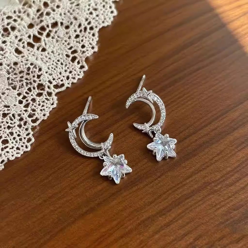 2026 new arrival: trendy silver star pendant moon earrings - women's unique, fashionable, exquisite, and versatile earrings wholesale