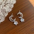 2026 new arrival: trendy silver star pendant moon earrings - women's unique, fashionable, exquisite, and versatile earrings wholesale