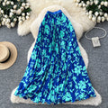 French chic printed high-waisted slimming a-line pleated midi skirt - perfect for vacation or work