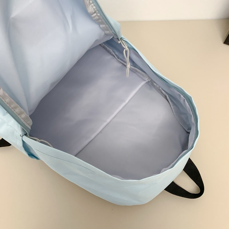 New fashion simple trend backpack large capacity lightweight travel backpack Korean version of junior high school student schoolbag