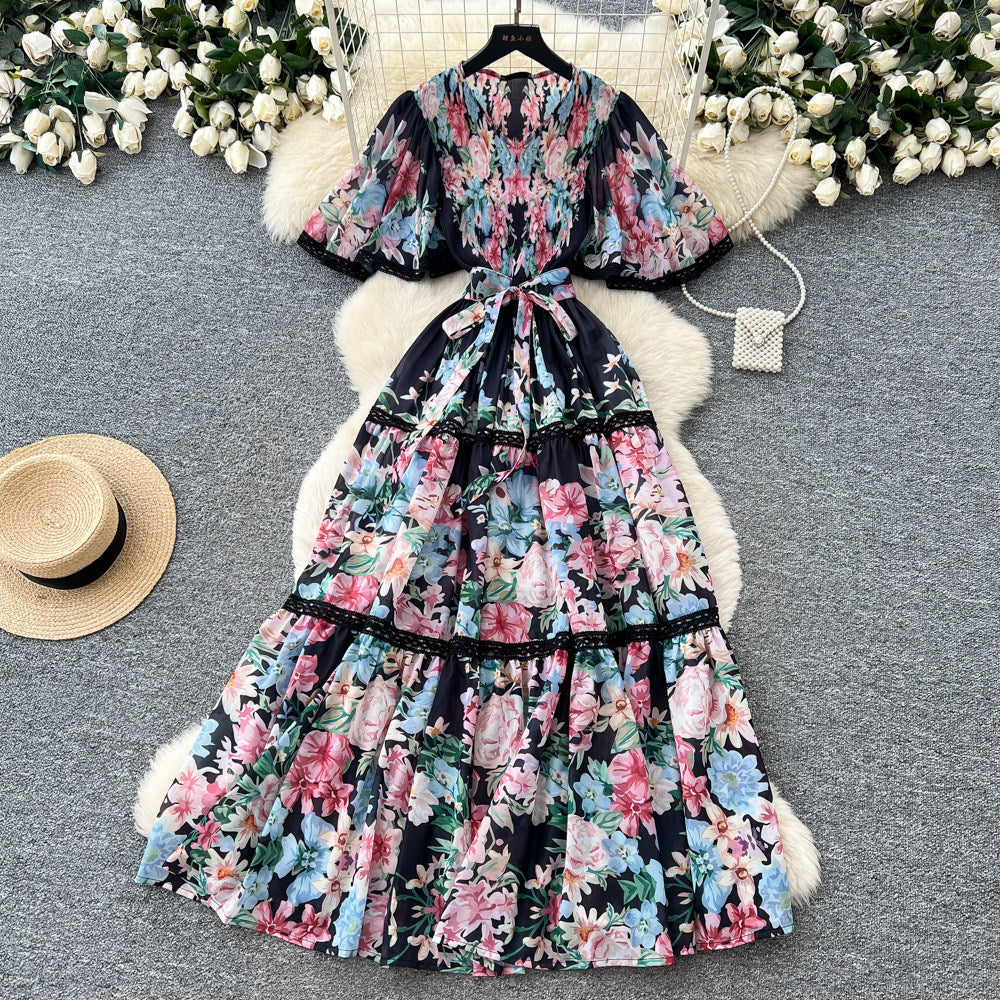 French riviera style printed short-sleeve pleated dress - women's summer v-neck, cinched waist, tie-up maxi dress - high-end, slimming fit