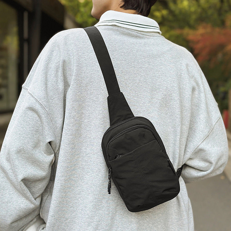 Small breast bag men's simple mini small satchel men's summer casual mobile phone bag carry-on bag men's messenger bag women