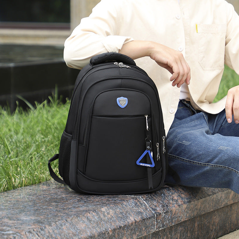 Short trip backpack with pendant, light backpack, men's large-capacity business computer bag, junior high school student schoolbag