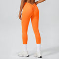 Fashion nude pleated yoga pants women's tight high waist hip lifting peach sports fitness pants breathable running pants