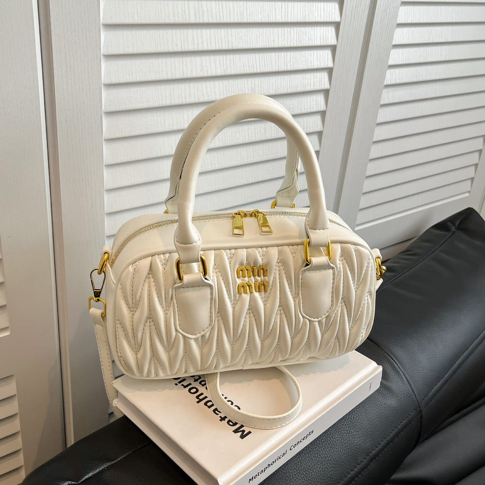 Niche pleated mini pillow bag 2025 new shoulder fashion crossbody bag autumn and winter retro handheld bowling bag