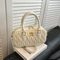 Niche pleated mini pillow bag 2025 new shoulder fashion crossbody bag autumn and winter retro handheld bowling bag