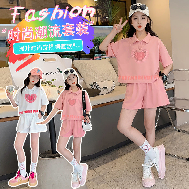 new girls' summer outfit set: stylish and trendy, perfect for older girls. summer-inspired short-sleeve and shorts set with heart-themed polo shirt – a popular choice for kids' summer fashion