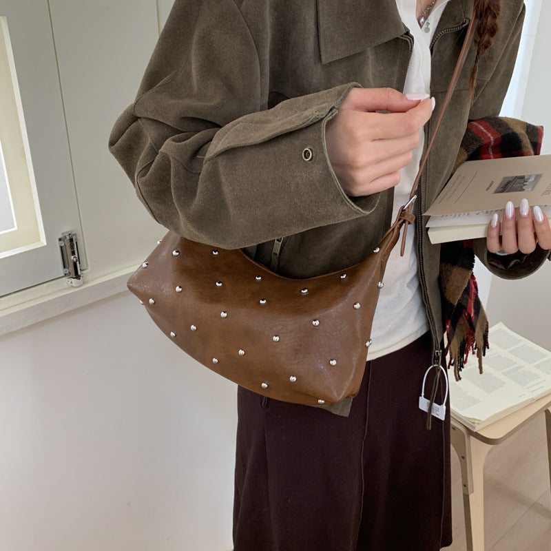 New arrivalaccessible luxury armpit bag for women, large capacity, trendy style, rivet design, crossbody tote bag, work clothing shoulder bag