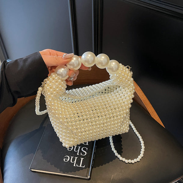 Pure hand-woven dinner bag female French retro fairy pearl bag trendy Internet celebrity large capacity portable shoulder bag