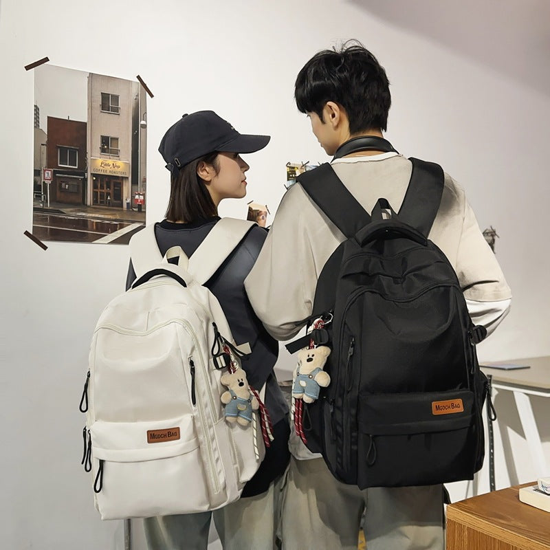 New high school students reduce the burden of backpacks, large-capacity student schoolbags, women's leisure travel, mountaineering backpacks, men's