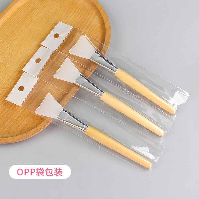 Beauty salon wooden handle silicone mask brush diy facial mask application tool wooden pole makeup brush soft head silicone brush