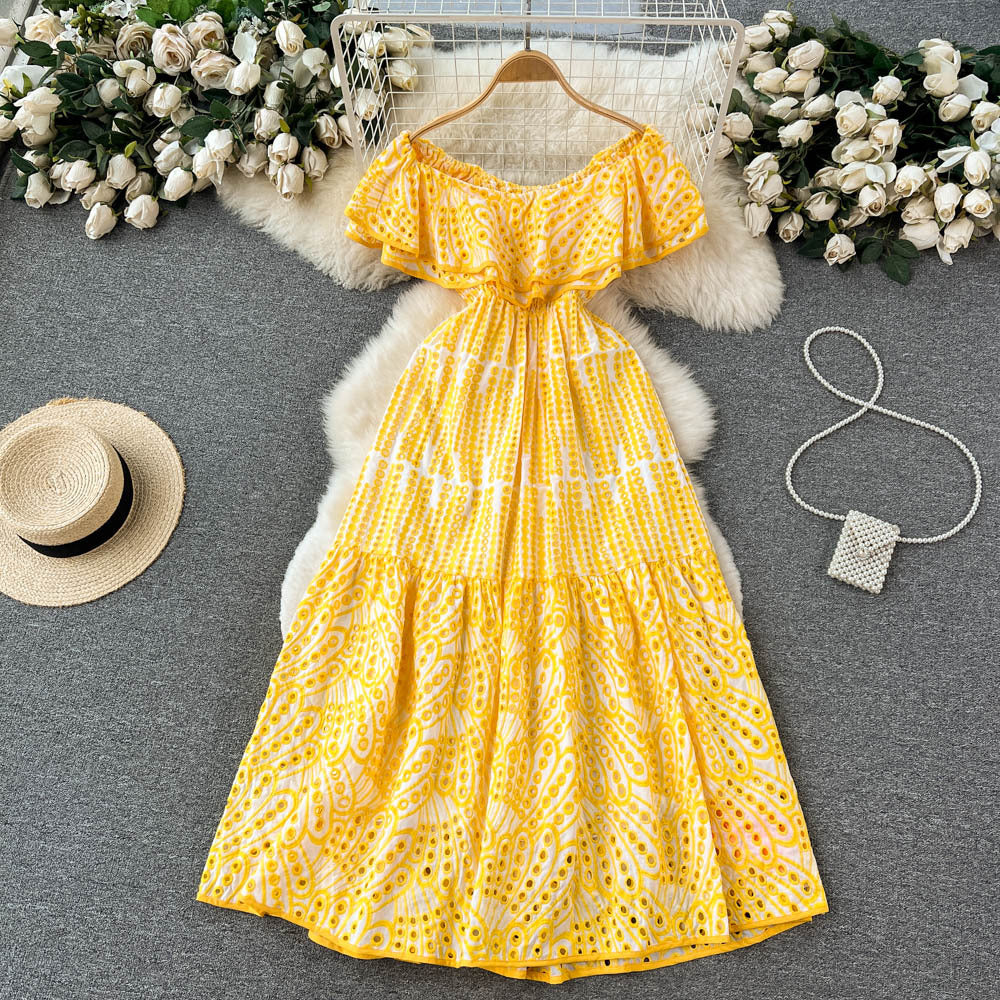 Elegant, sophisticated, and effortlessly chic: this ruffled, off-the-shoulder, lace-embroidered, and cutout maxi dress is perfect for a glamorous beach vacation
