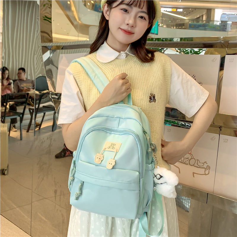School bag female college student Korean version ins solid color simple and versatile junior high school student travel small backpack high school student backpack