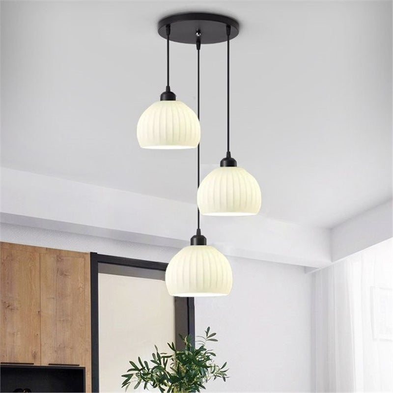 Modern minimalist dining room pendant light - creamy new style  - trending online - perfect for dining tables, bedrooms, studies, and bar counters - glass pendant lamp
