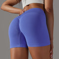 fashion seamless knitting breathable pure color cross waist peach butt yoga shorts running fitness three-quarter pants women