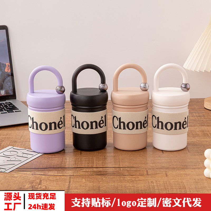 Here are a few options, depending on the specific nuance you want to convey:  **option 1 (focus on features):**  "women's compact & portable insulated tumbler: stylish 316 stainless steel water bottle, perfect for office coffee - cross-border exclusive"