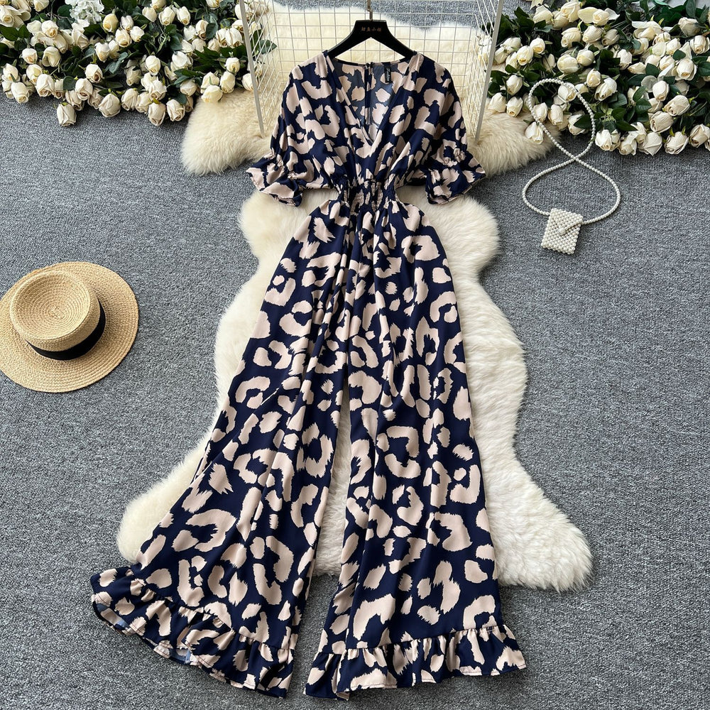 Summer vacation chic: effortless & mature casual v-neck short sleeve jumpsuit with elastic waist, high waist, slimming wide leg, and printed design