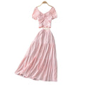 Korean-inspired, stylish and chic women's two-piece set featuring a puff-sleeve, square-neck top and a high-waisted, figure-flattering midi skirt