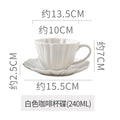 White coffee cup and saucer