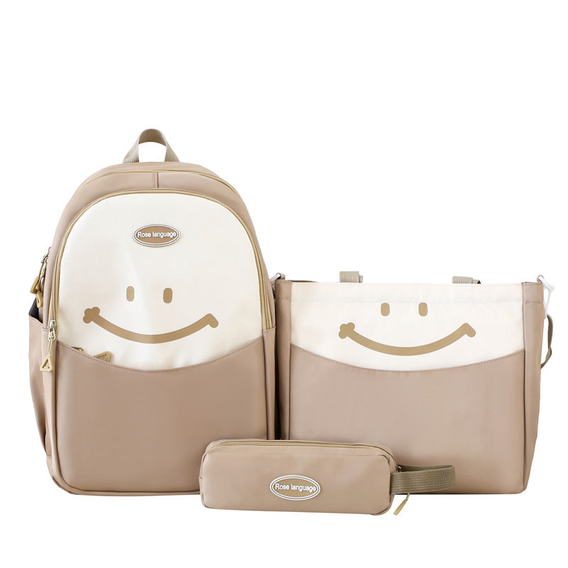 Cute smiley face, primary and secondary school student schoolbag, simple and fashionable, large-capacity backpack, small and fresh, going out travel backpack.