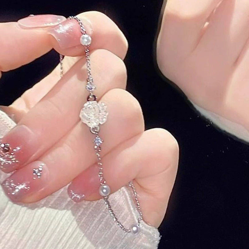 French camellia pearl bracelet for women, 2026 new arrival, light luxury niche style, lightweight luxury fashionable versatile hand jewelry