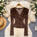 Sophisticated leopard print v-neck shirt: breathable, skin-friendly, long-sleeved top for women - perfect for summer, work, and a slimming, versatile look