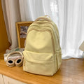 New schoolbag large capacity water-resistant embroidered backpack for junior and senior high school students - solid color, simple, and cute design