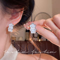 Micro-paved zirconia flower stud earrings - trendy, chic, and effortlessly elegant. a versatile and minimalist accessory for women
