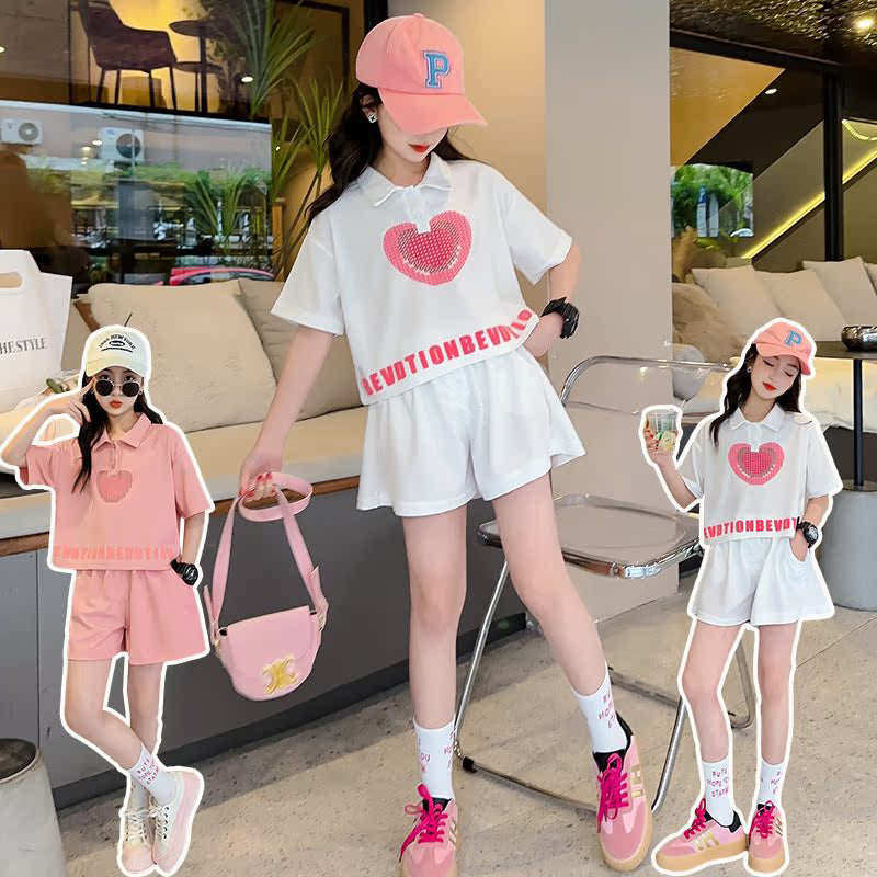 new girls' summer outfit set: stylish and trendy, perfect for older girls. summer-inspired short-sleeve and shorts set with heart-themed polo shirt – a popular choice for kids' summer fashion