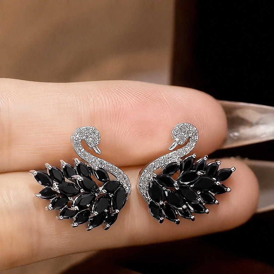 Copper alloy earrings: luxurious, exquisite, and ultra-sparkling zircon swan design. a chic and versatile statement piece for autumn and winter. hot-selling stud earrings