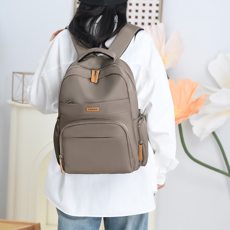 New commuter backpack women's large-capacity women's backpack fashionable anti-splashing nylon bag solid color student schoolbag