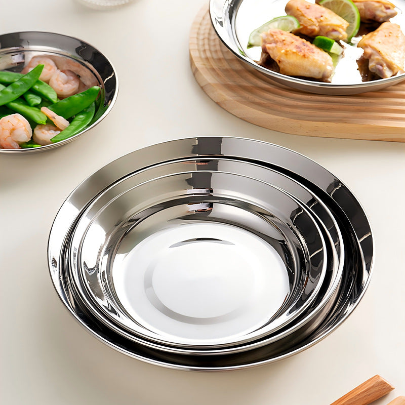 Factory direct wholesale food-grade tableware: 316 stainless steel flat-bottom round dishes, steaming trays, deep soup bowls, and fruit bowls for home use