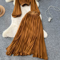 French style women's autumn outfit: elegant cinched-waist cropped lantern sleeve blouse with high-waisted, flowy slit midi skirt two-piece set