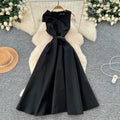 High-end women's french style formal dress - elegant, sleeveless, v-neck, cinched waist, slimming, and flattering a-line maxi dress with 3d bow detail