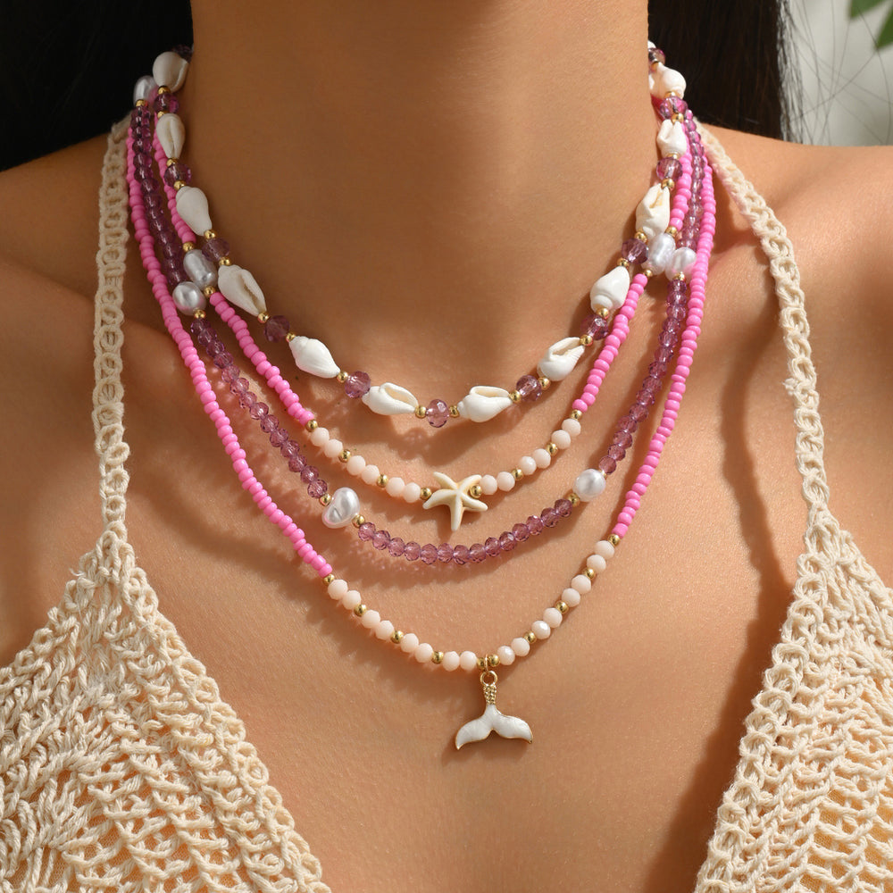 Wholesale seaside necklaces: european and american cross-border ocean-inspired statement jewelry featuring exaggerated shell pendants, light luxury, niche designs, and dyed crushed stone accents for women