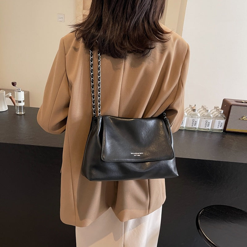 Solid color simple large-capacity foreign gas bag women's 2025 new trendy underarm commuter chain single shoulder tote bag